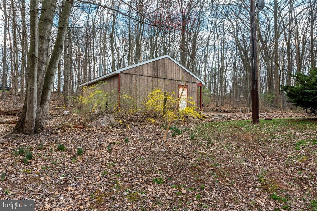 211 Mountain View Circle Denver, PA 17517 - Photo 29 of 31 a backyard of a house with lots of green space