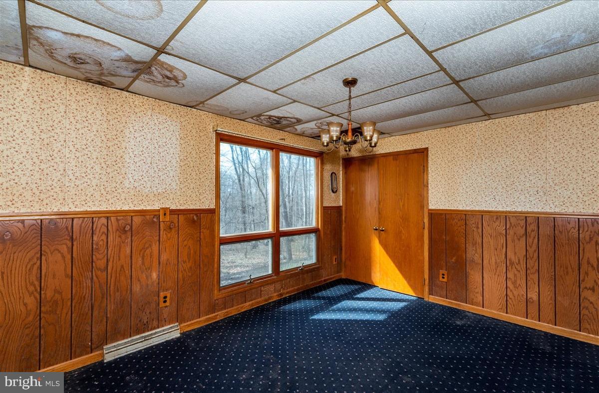211 Mountain View Circle Denver, PA 17517 - Photo 5 of 31 a view of an empty room with a window