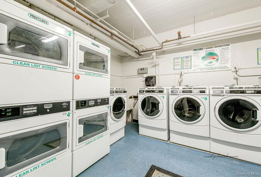 72-10 112th Street, Unit 5B Queens, NY 11375 - Photo 27 of 27 a utility room with dryer and washer