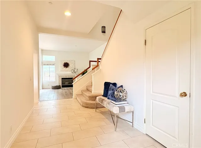 a living room with furniture and a gate