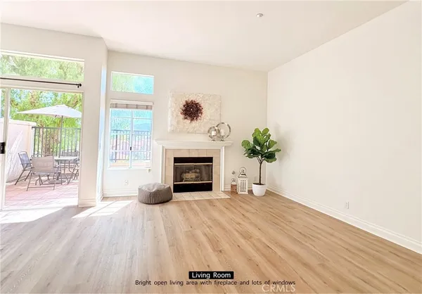 an outdoor space with furniture and umbrella