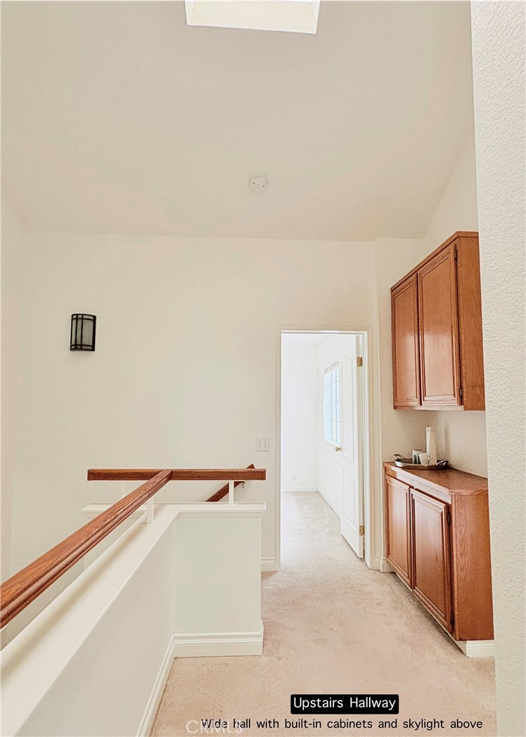 620 Ivywood Lane, Unit F Simi Valley, CA 93065 - Photo 25 of 40 Upstairs hall with Skylight above