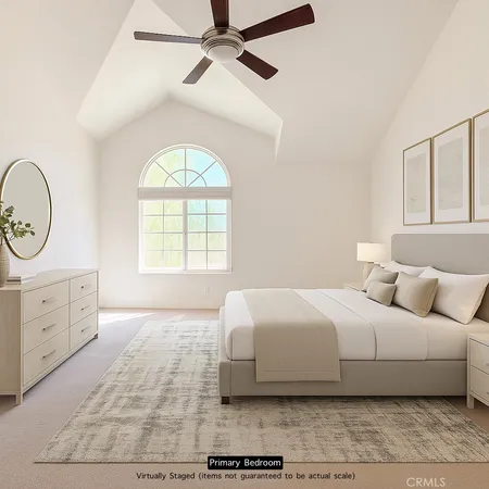 a front view of a house with a yard table and chairs
