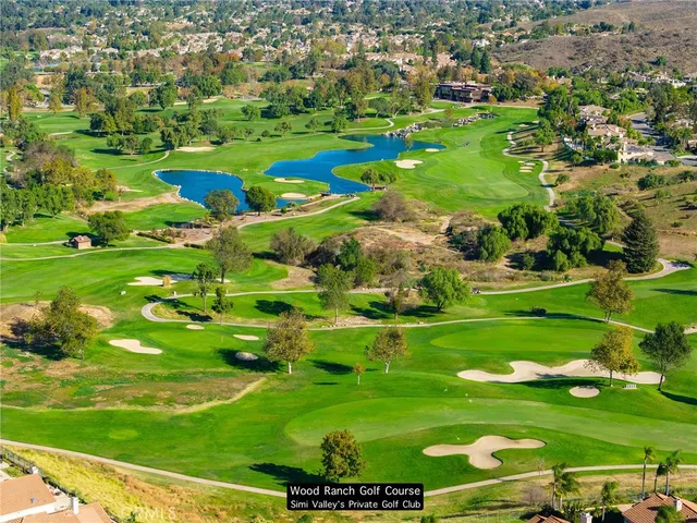 a view of a golf course with a yard
