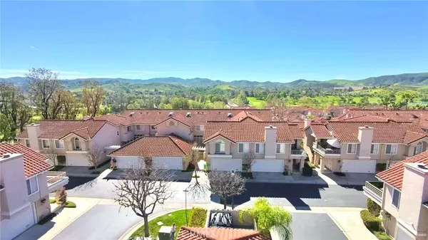 a view of city from terrace with seating space