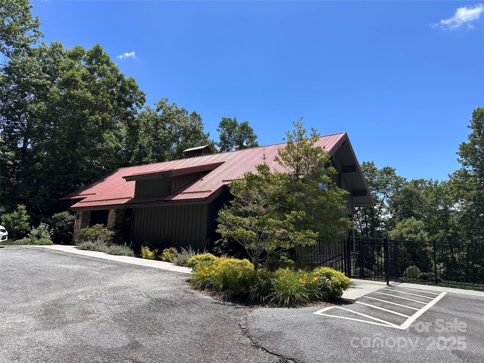 66 Boone Cove Road Zirconia, NC 28790 - Photo 9 of 15 a front view of a house with a yard