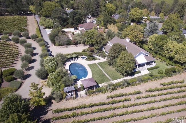 Undisclosed Address St. Helena, CA 94574 - Photo 1 of 1 an aerial view of a house with a yard and black chairs