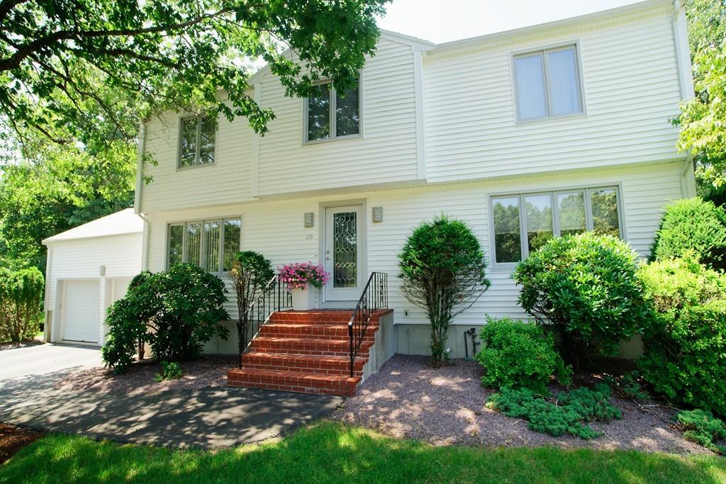 30 Aspen Road Sharon, MA 02067 - Photo 1 of 24 a view of a house with backyard and a garden
