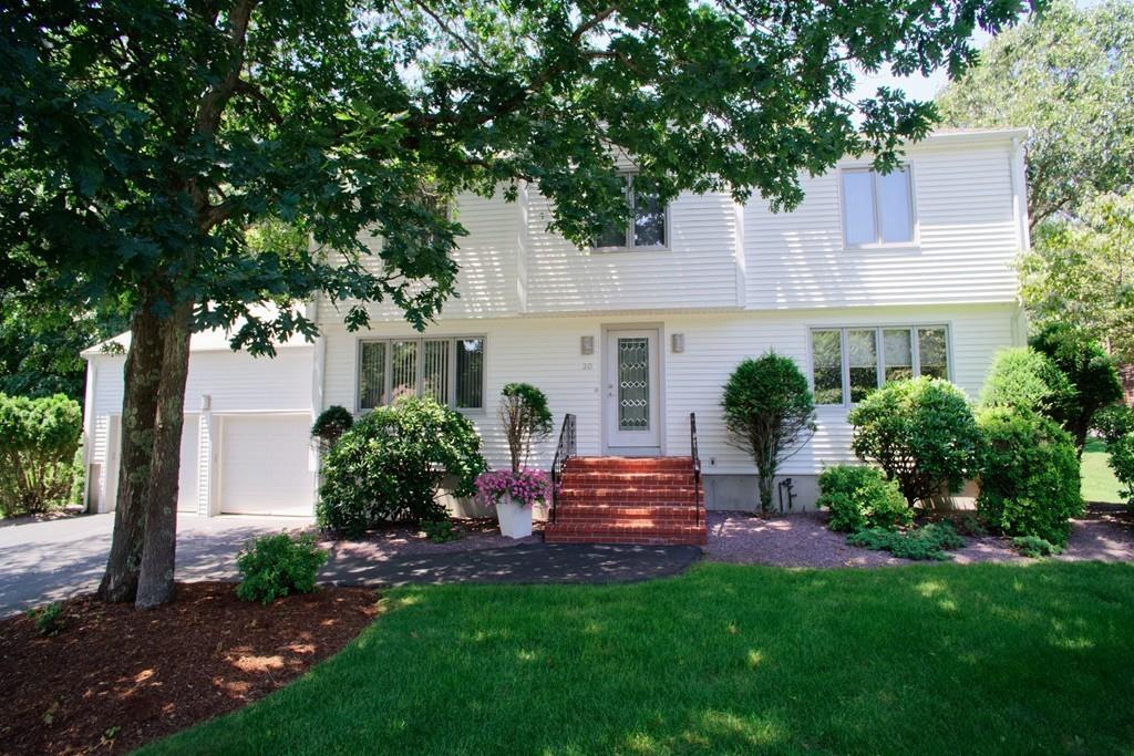 30 Aspen Road Sharon, MA 02067 - Photo 2 of 24 a view of a house with backyard sitting area and garden