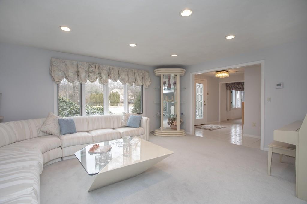 30 Aspen Road Sharon, MA 02067 - Photo 8 of 24 a living room with furniture and a large window