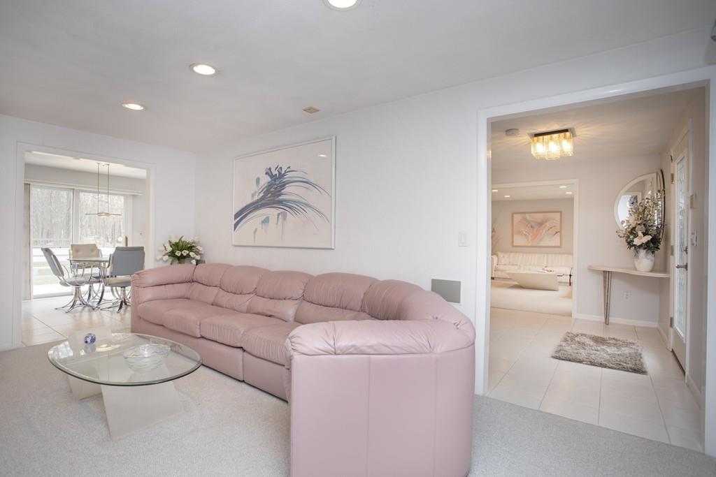 30 Aspen Road Sharon, MA 02067 - Photo 9 of 24 a living room with furniture and a table