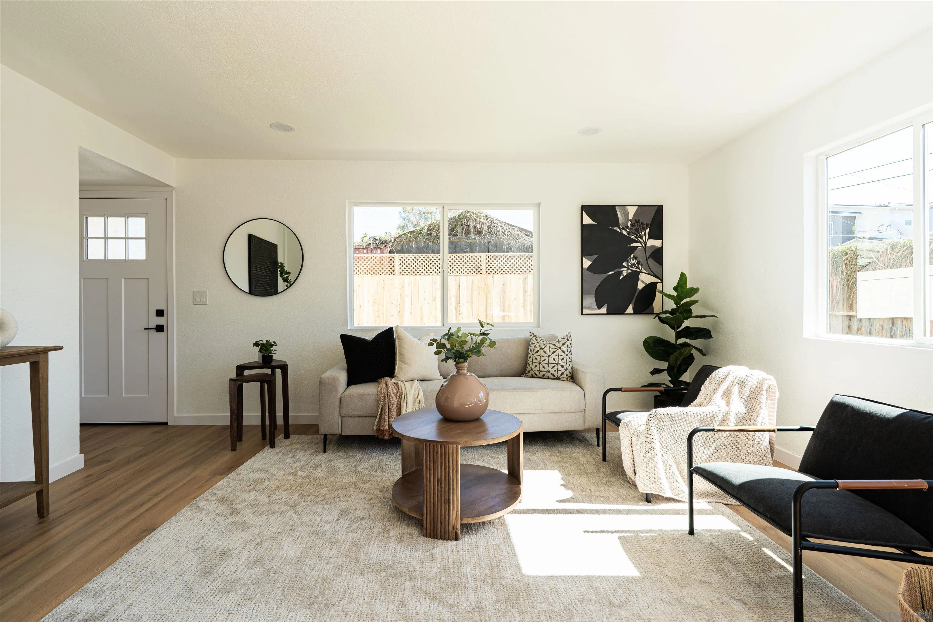 3101 King Arthurs Court Spring Valley, CA 91977 - Photo 13 of 40 a living room with furniture and wooden floor