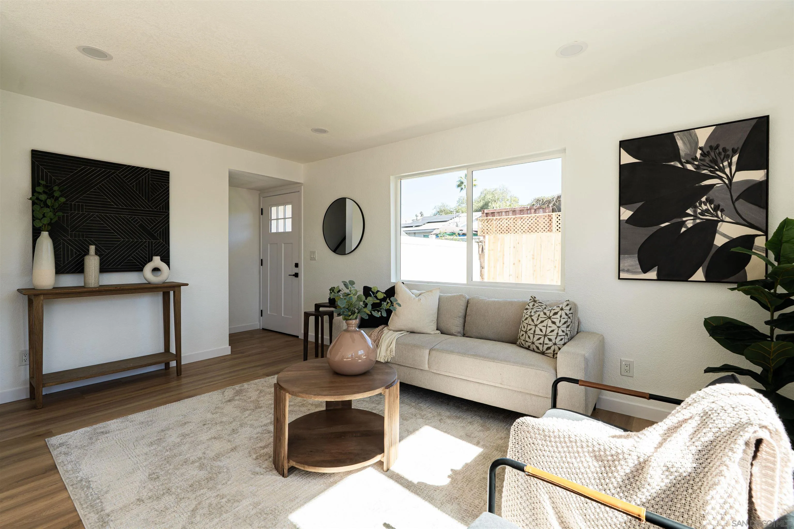 3101 King Arthurs Court Spring Valley, CA 91977 - Photo 14 of 40 a living room with furniture and a flat screen tv
