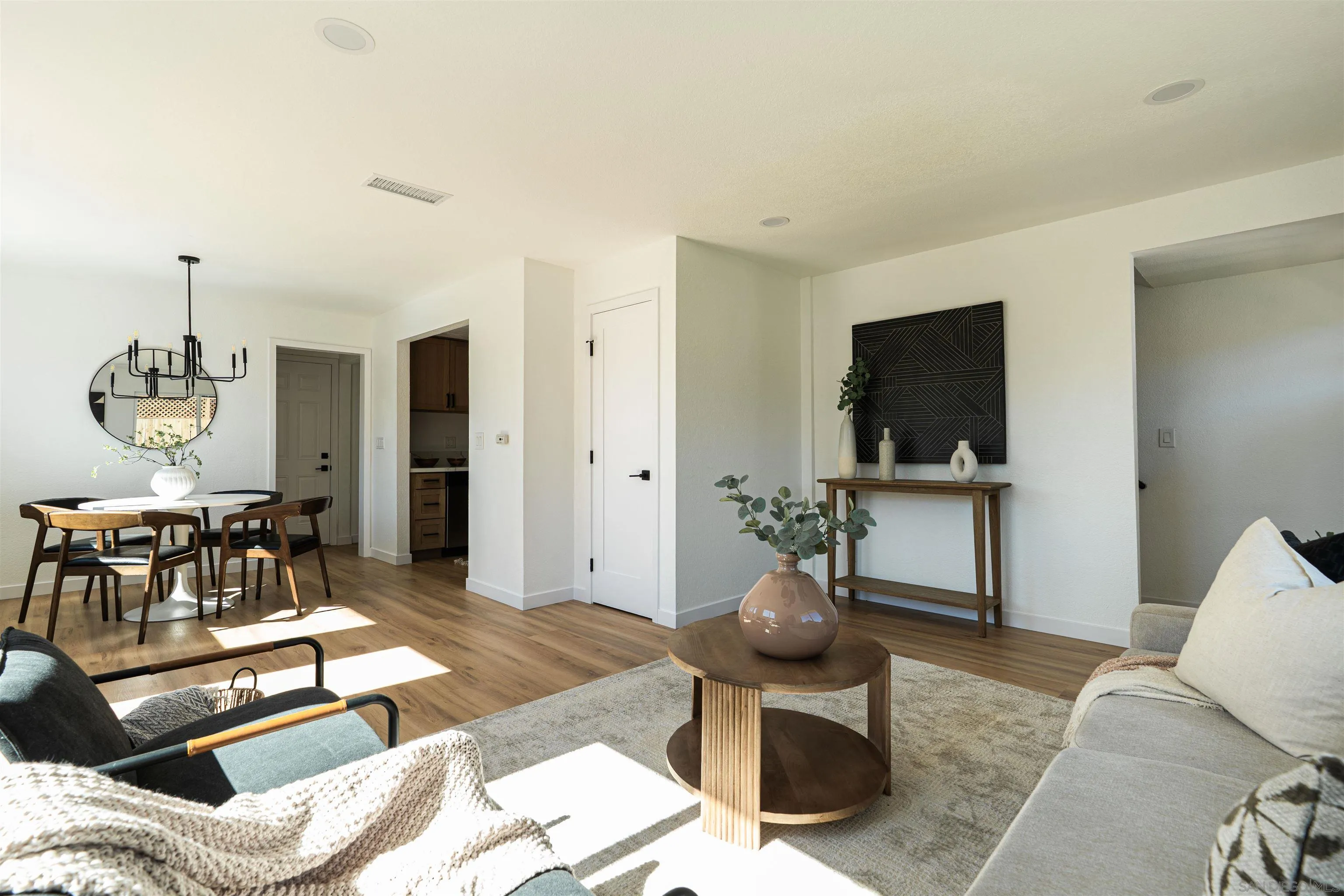 3101 King Arthurs Court Spring Valley, CA 91977 - Photo 16 of 40 a living room with furniture and a flat screen tv