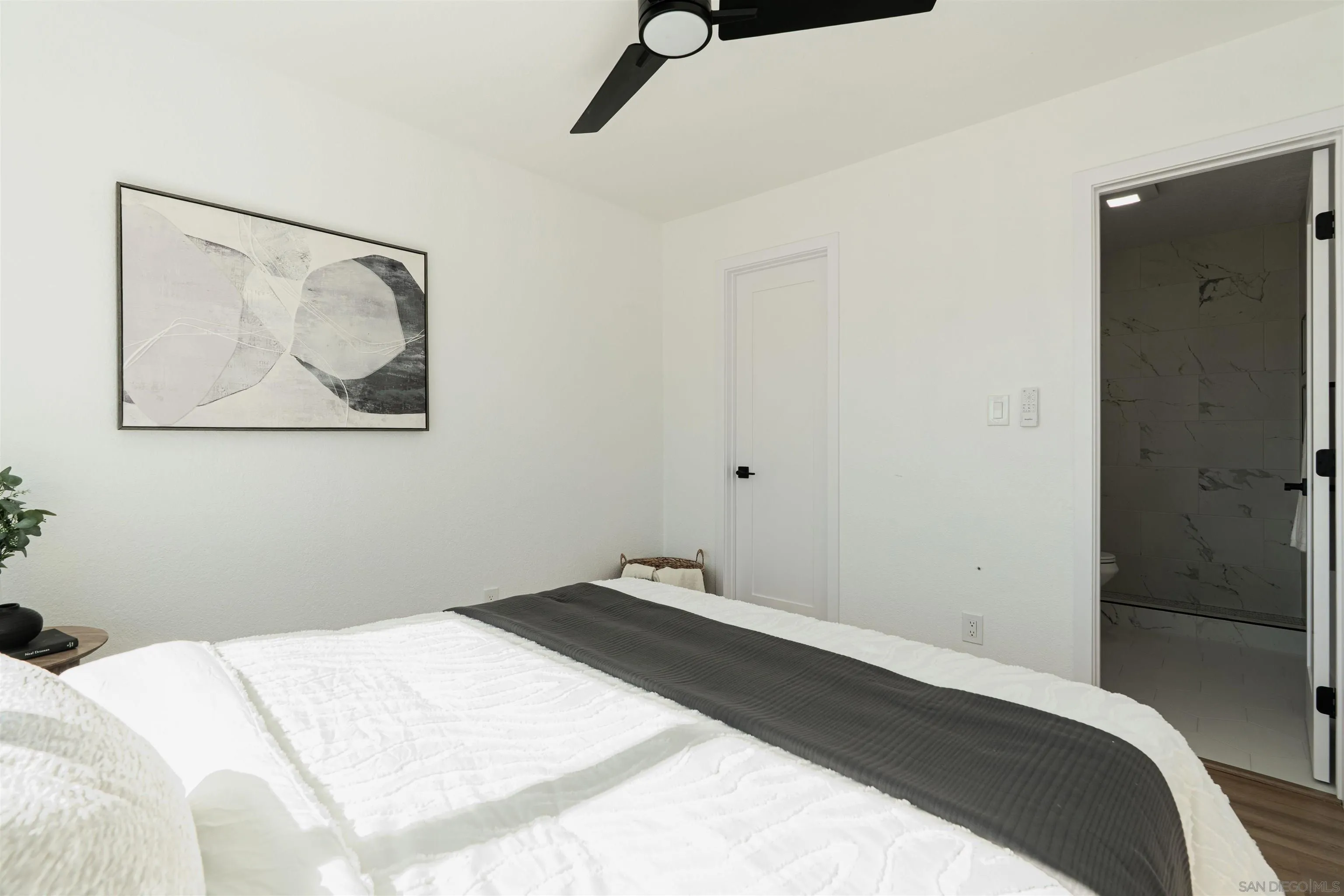 3101 King Arthurs Court Spring Valley, CA 91977 - Photo 29 of 40 a bedroom with a bed and the view of bathroom