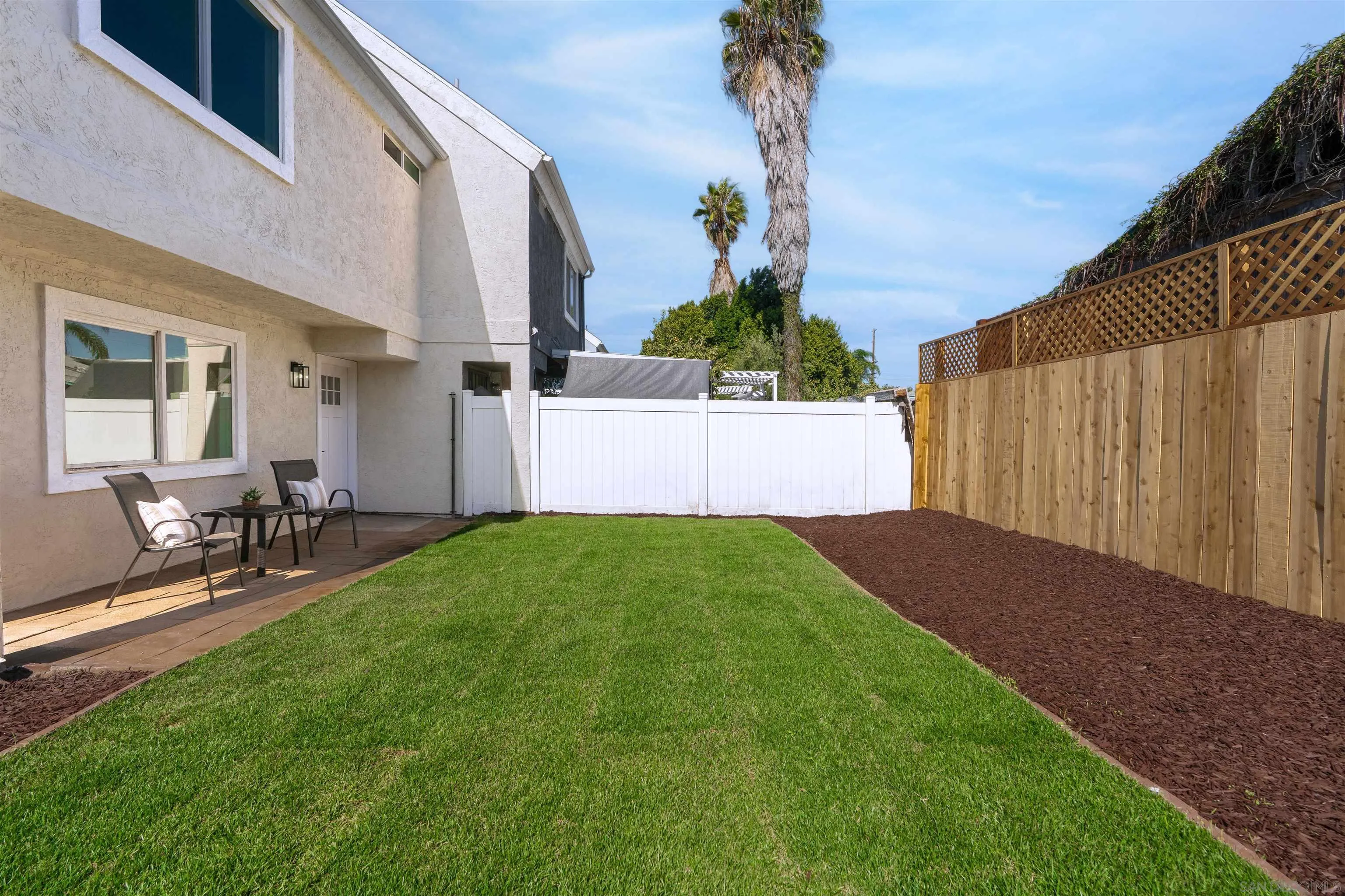 3101 King Arthurs Court Spring Valley, CA 91977 - Photo 35 of 40 a view of backyard of house with green space