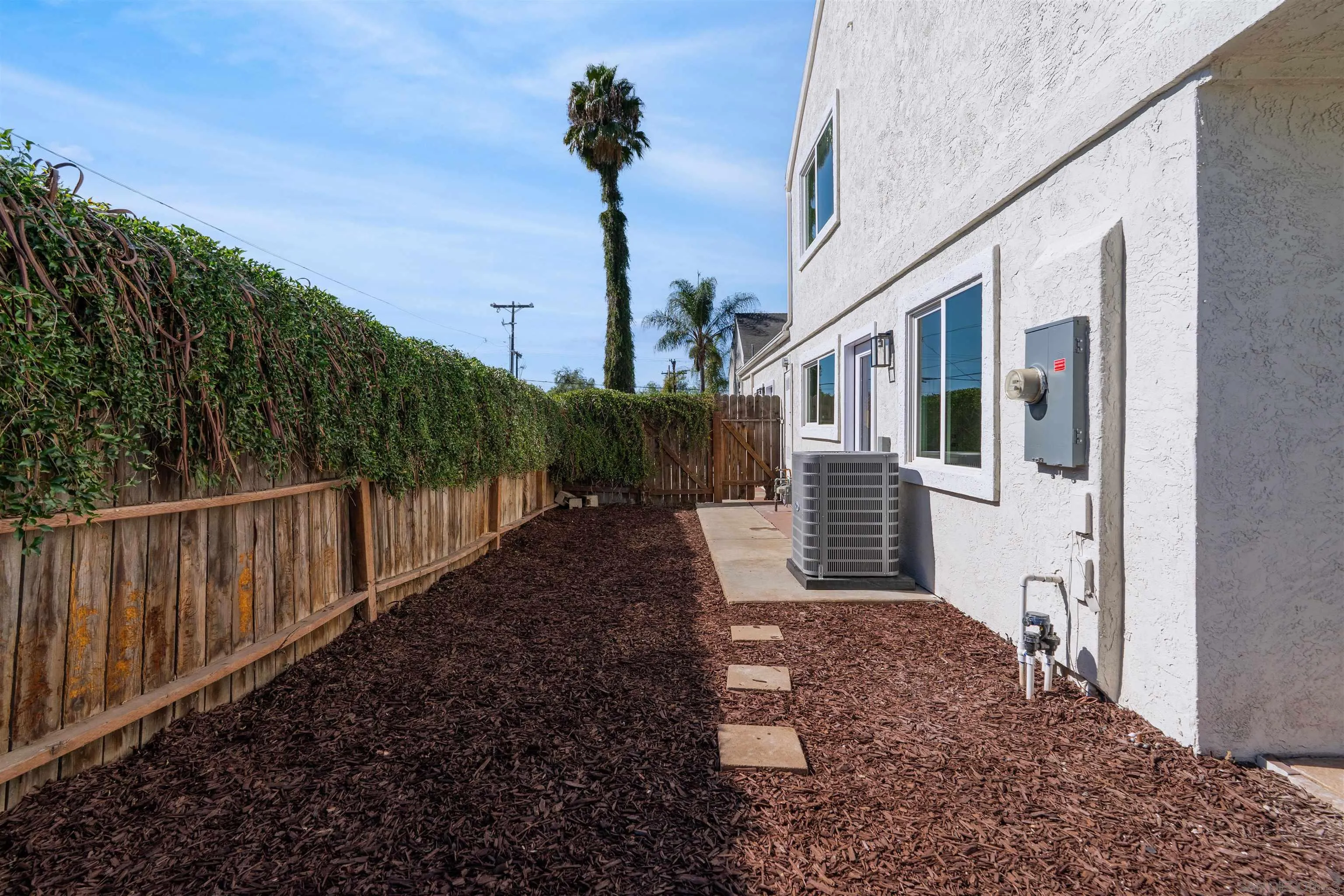3101 King Arthurs Court Spring Valley, CA 91977 - Photo 36 of 40 a view of a house with wooden fence
