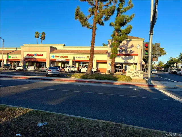 a view of a street with big building