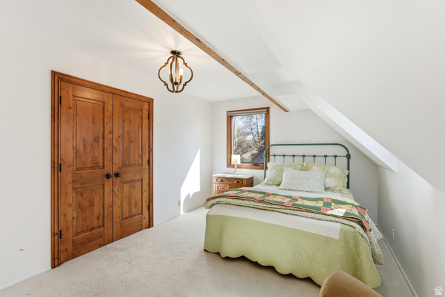 2635 Little Kate Road, Unit 21 Park City, UT 84060 - Photo 33 of 39 Carpeted bedroom with hanging lights