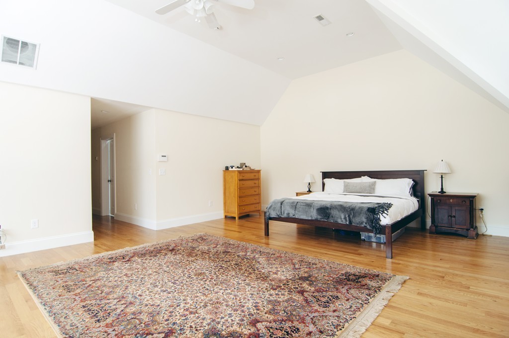 90 Cedarcrest Road Canton, MA 02021 - Photo 13 of 30 a bedroom with a bed and wooden floor
