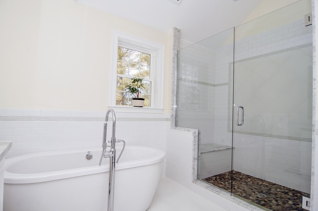 90 Cedarcrest Road Canton, MA 02021 - Photo 16 of 30 a bathroom with a sink a toilet and shower