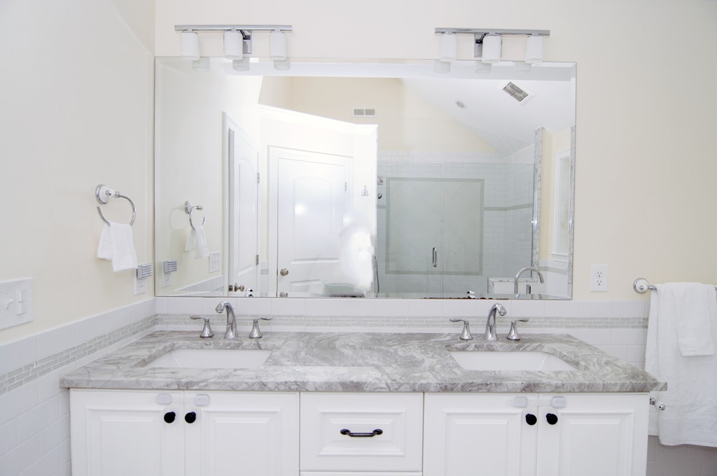 90 Cedarcrest Road Canton, MA 02021 - Photo 18 of 30 a bathroom with double sink and a mirror