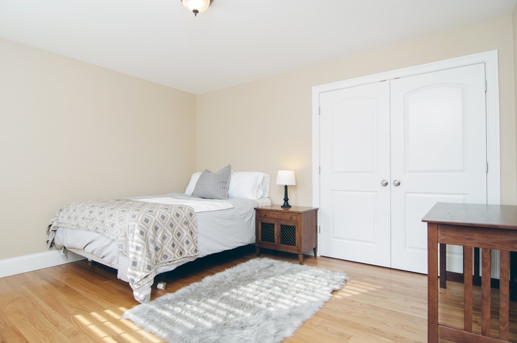 90 Cedarcrest Road Canton, MA 02021 - Photo 19 of 30 a bedroom with a bed and a table