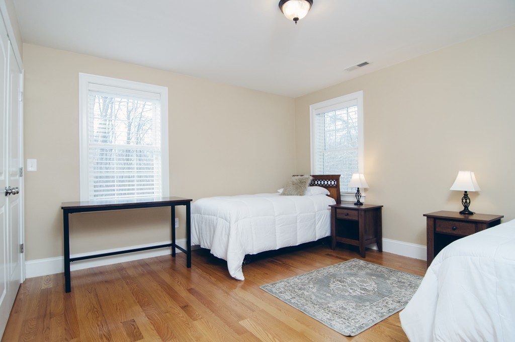90 Cedarcrest Road Canton, MA 02021 - Photo 22 of 30 a bed room with a bed and a night stand