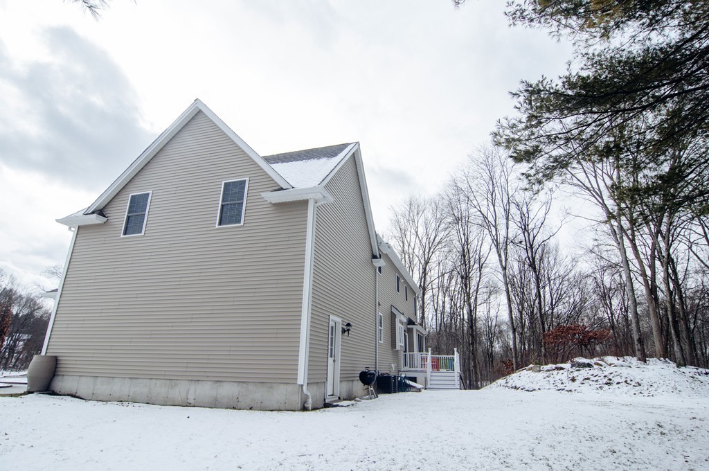 90 Cedarcrest Road Canton, MA 02021 - Photo 29 of 30 a front view of a house with a yard