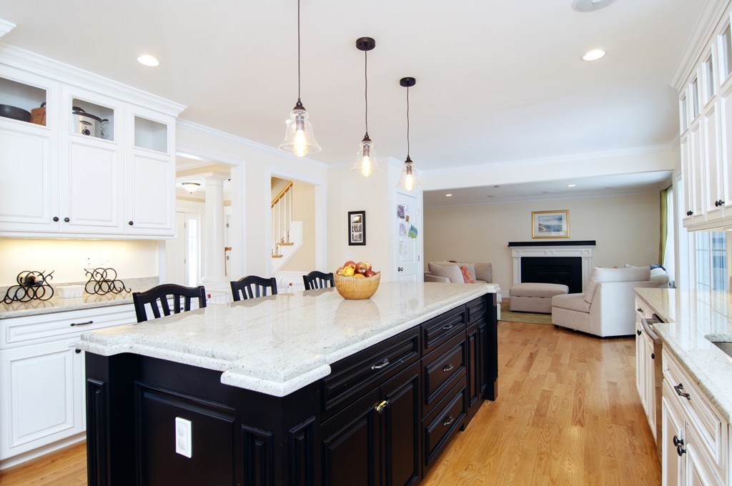 90 Cedarcrest Road Canton, MA 02021 - Photo 5 of 30 a kitchen with a sink a stove and chairs