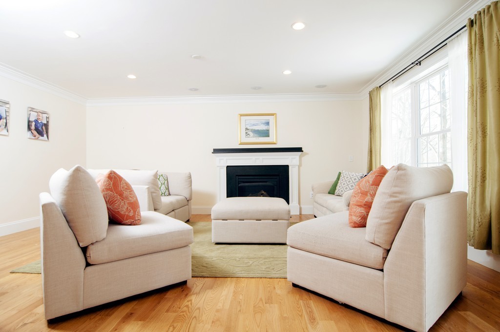 90 Cedarcrest Road Canton, MA 02021 - Photo 6 of 30 a living room with furniture and a fireplace