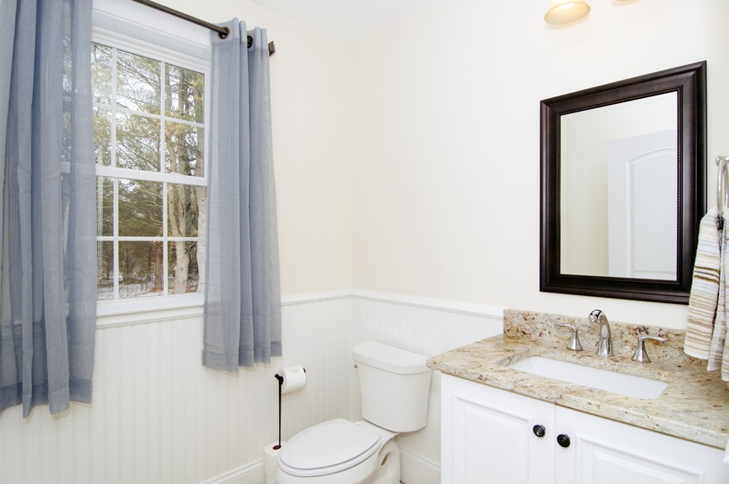 90 Cedarcrest Road Canton, MA 02021 - Photo 8 of 30 a bathroom with a granite countertop sink toilet and mirror