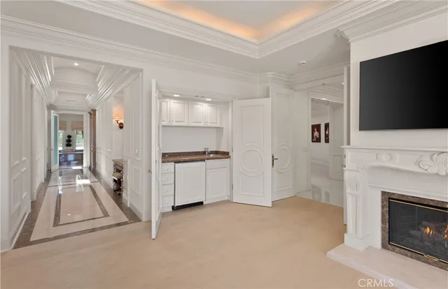 a view of kitchen living room with furniture and flat screen tv