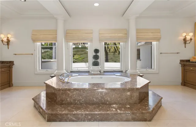 a view of a living room with large windows