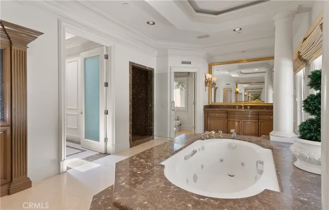 a bathroom with a bathtub and a sink