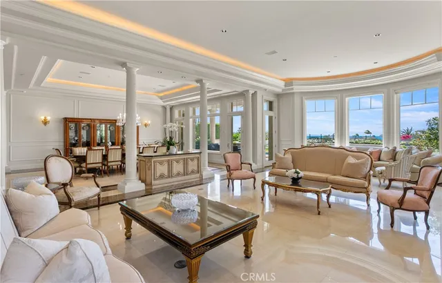 a living room with furniture and a table