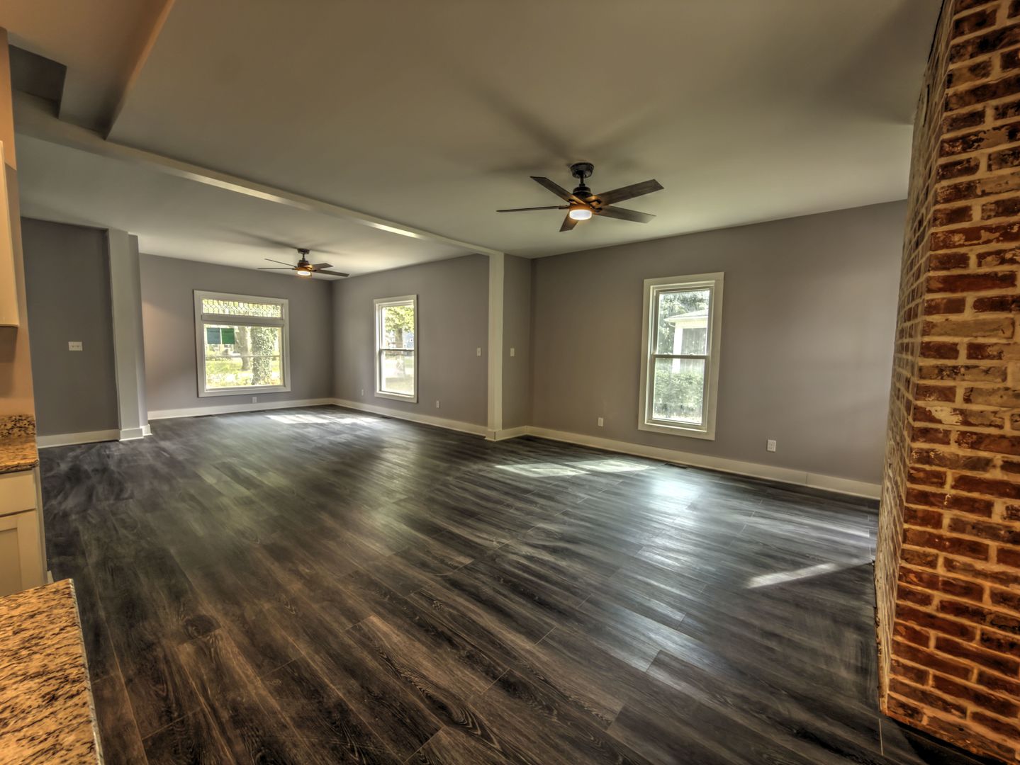 623 South 4th Street Watseka, IL 60970 - Photo 22 of 35 a view of an empty room with window and wooden floor