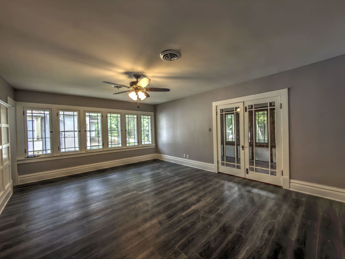 623 South 4th Street Watseka, IL 60970 - Photo 26 of 35 a view of an empty room with wooden floor and a window