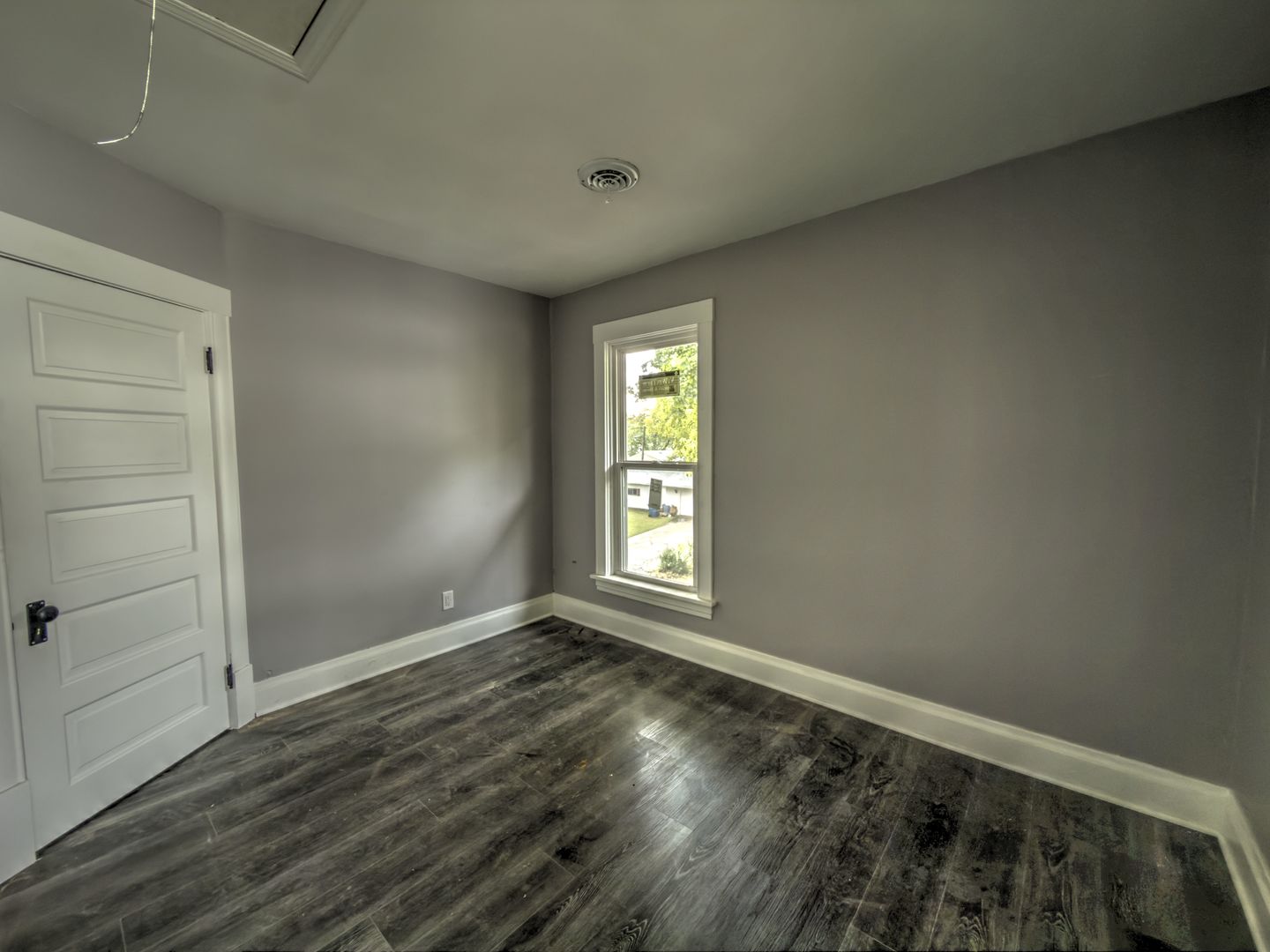 623 South 4th Street Watseka, IL 60970 - Photo 33 of 35 a view of empty room with wooden floor and fan