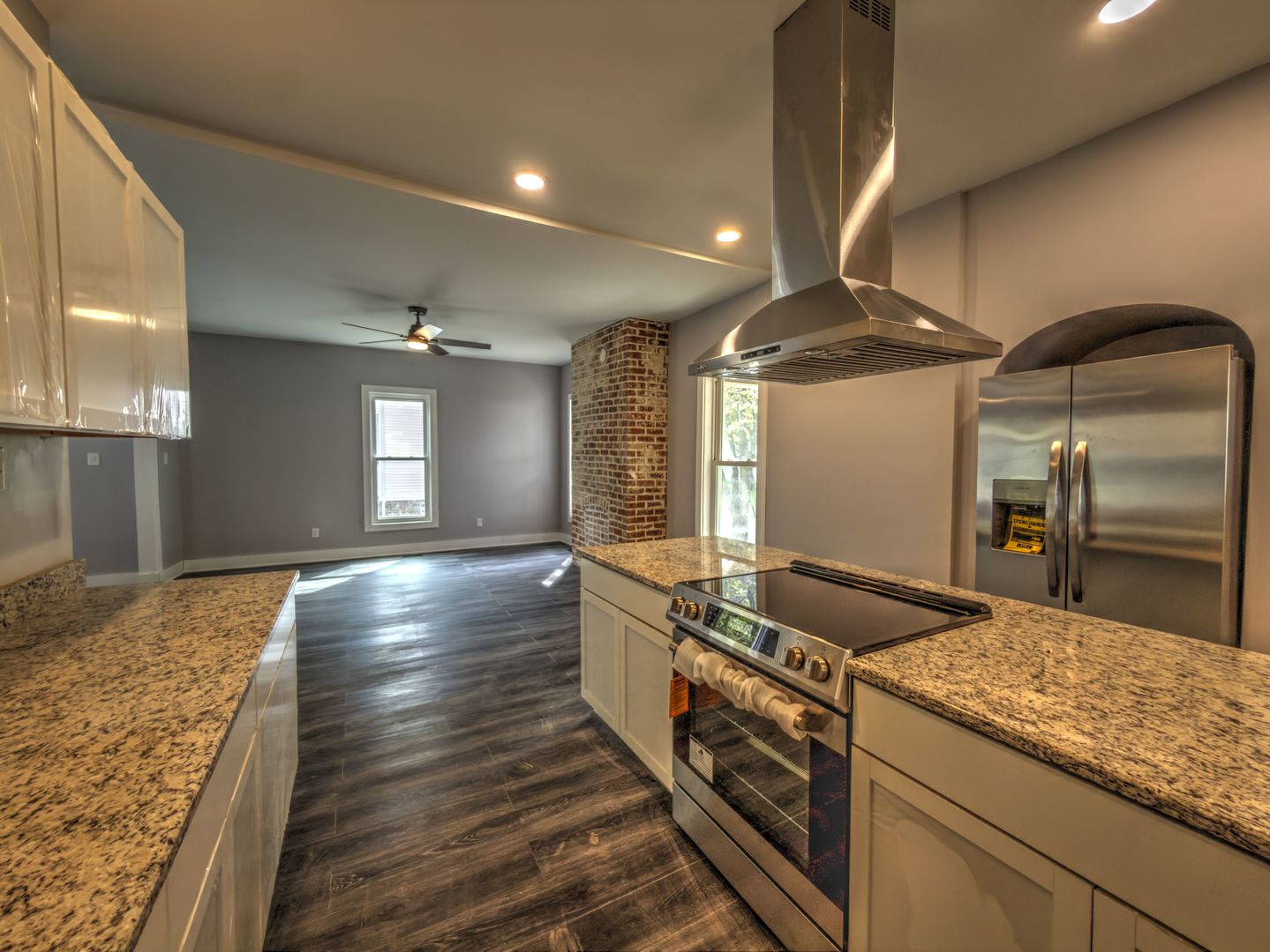 623 South 4th Street Watseka, IL 60970 - Photo 10 of 35 a kitchen with stainless steel appliances granite countertop a sink and stove
