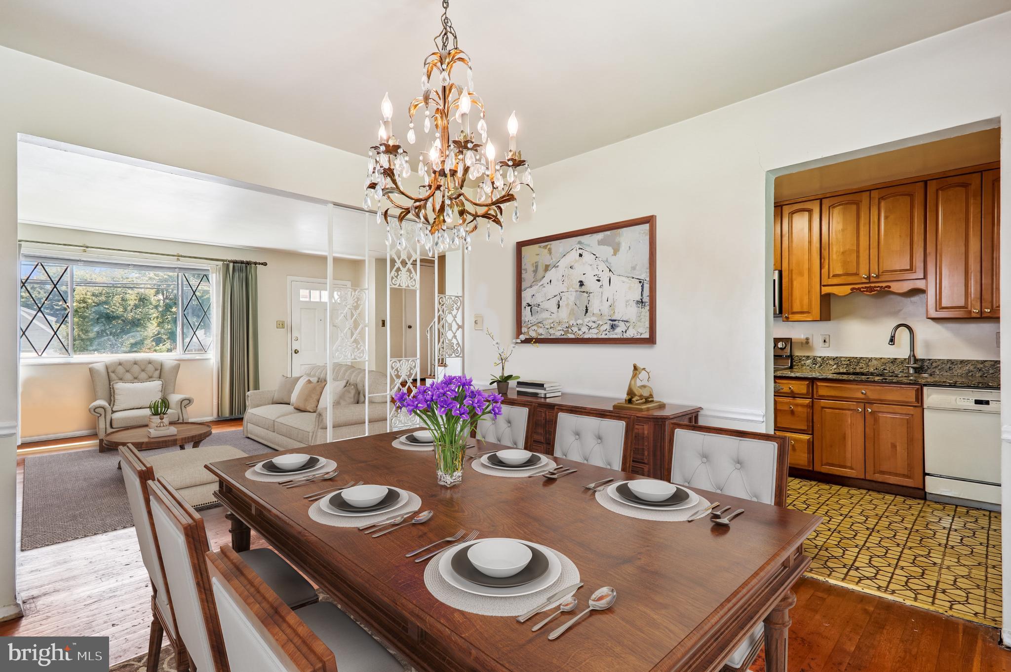 9507 Adelphi Road Silver Spring, MD 20903 - Photo 10 of 41 a view of a dining room with furniture and a chandelier