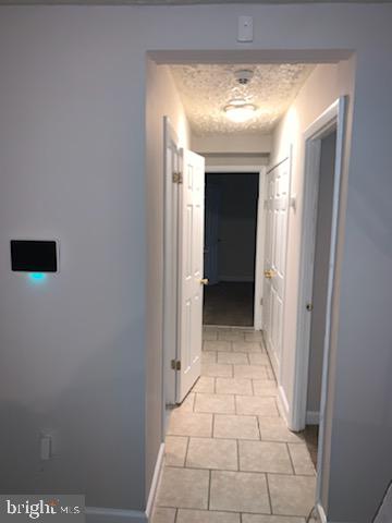 3823 St Barnabas Road, Unit T2 Suitland, MD 20746 - Photo 5 of 11 a view of a hallway