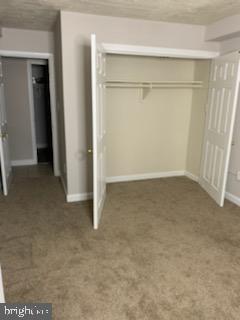 3823 St Barnabas Road, Unit T2 Suitland, MD 20746 - Photo 7 of 11 an empty room with a sliding door