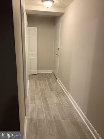3823 St Barnabas Road, Unit T2 Suitland, MD 20746 - Photo 9 of 11 a view of hallway with walk in closet