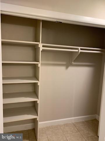 3823 St Barnabas Road, Unit T2 Suitland, MD 20746 - Photo 10 of 11 a view of walk in closet with empty racks