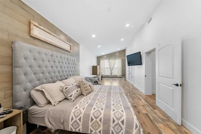 a bed room with a bed and a couch