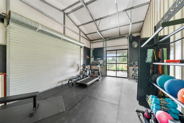 a view of a chairs and table in a room