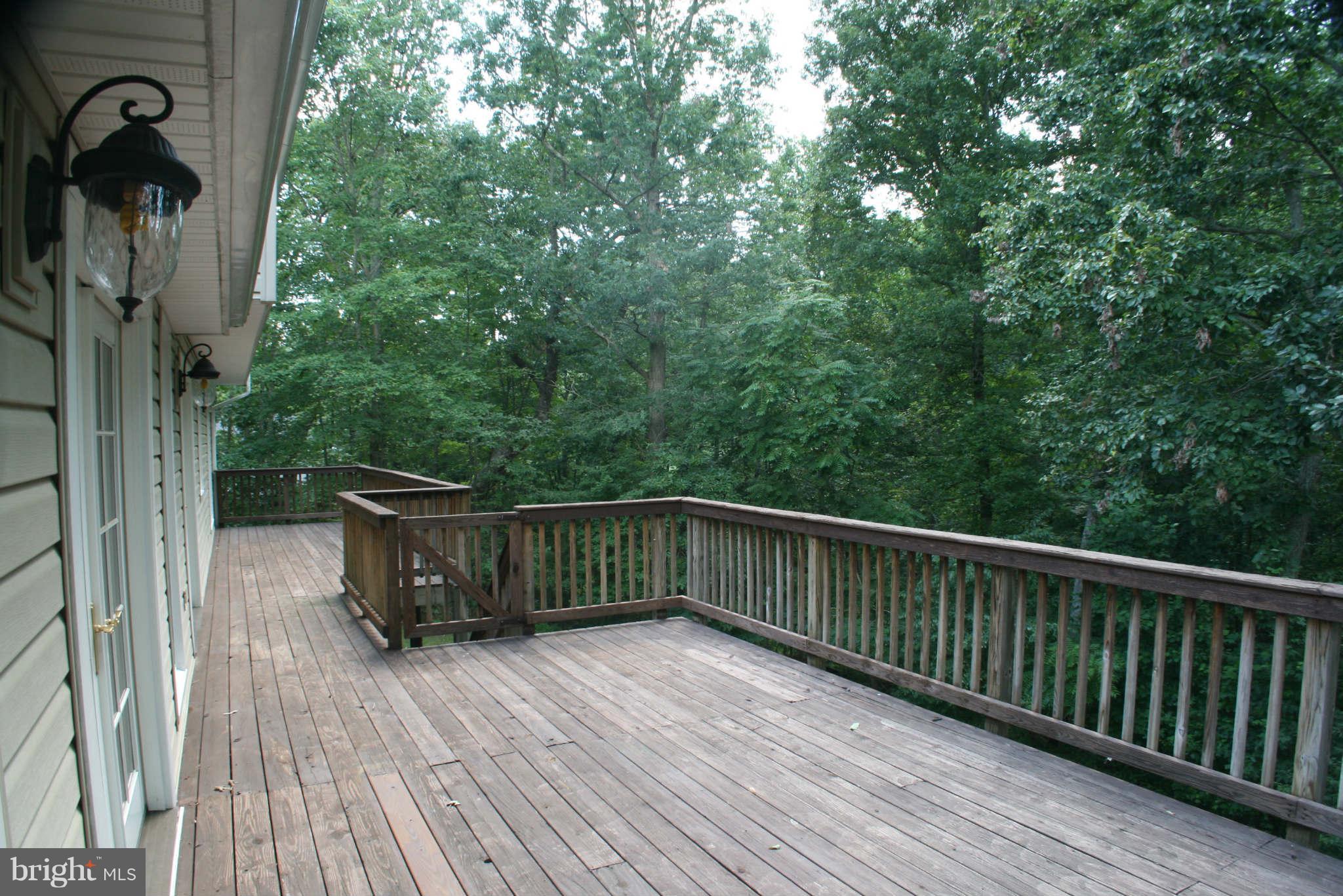 5900 Free State Road Marshall, VA 20115 - Photo 12 of 30 a view of deck and deck with trees