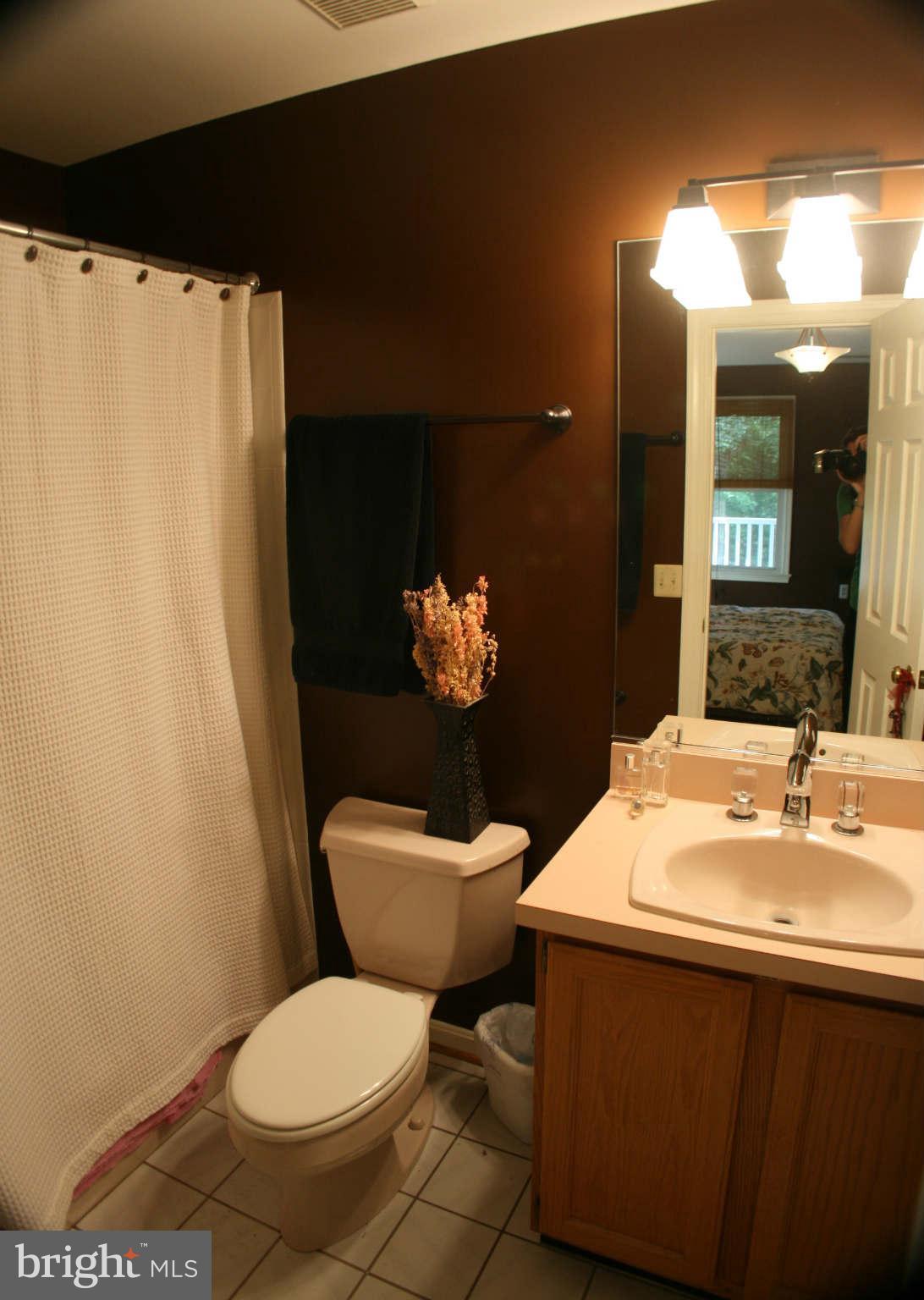 5900 Free State Road Marshall, VA 20115 - Photo 23 of 30 a bathroom with a sink toilet and a mirror