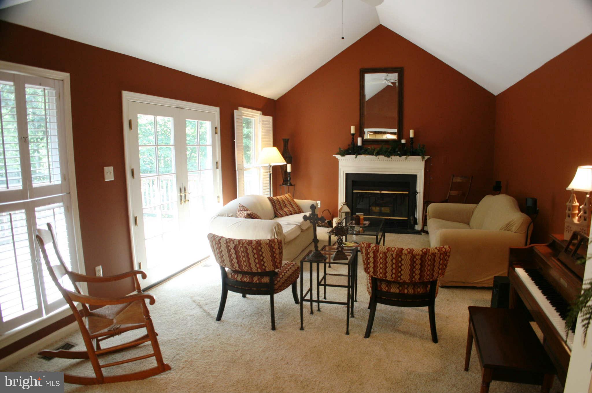 5900 Free State Road Marshall, VA 20115 - Photo 8 of 30 a dining room with furniture a fireplace and wooden floor